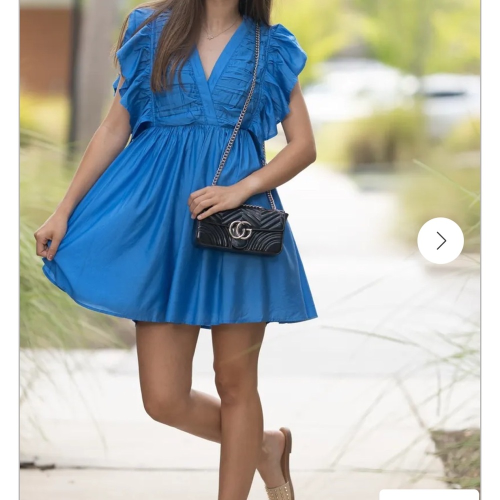 Blue Ruffled V-Neck Dress with Black Quilted Crossbody Bag